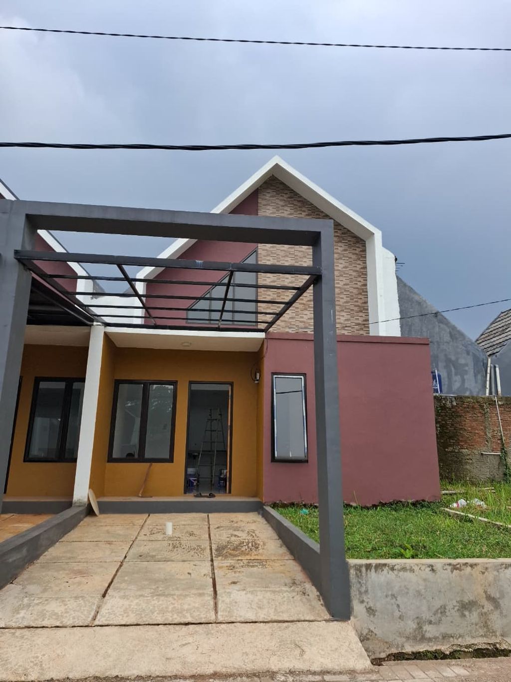 foto tampak rumah tipe T 36/108 perumahan Bumi Purwa Raya Dangdeur Tahap II