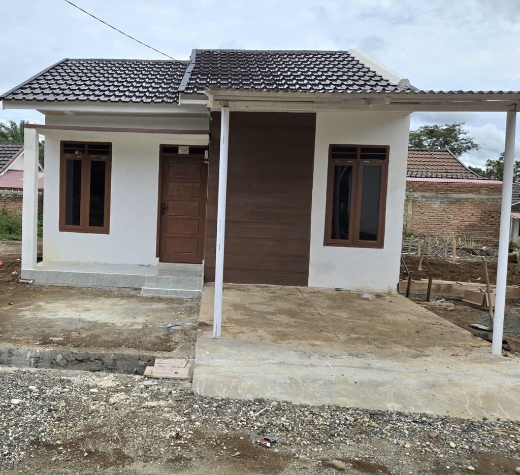 foto tampak rumah tipe 36 perumahan Cempaka Wijaya Resort