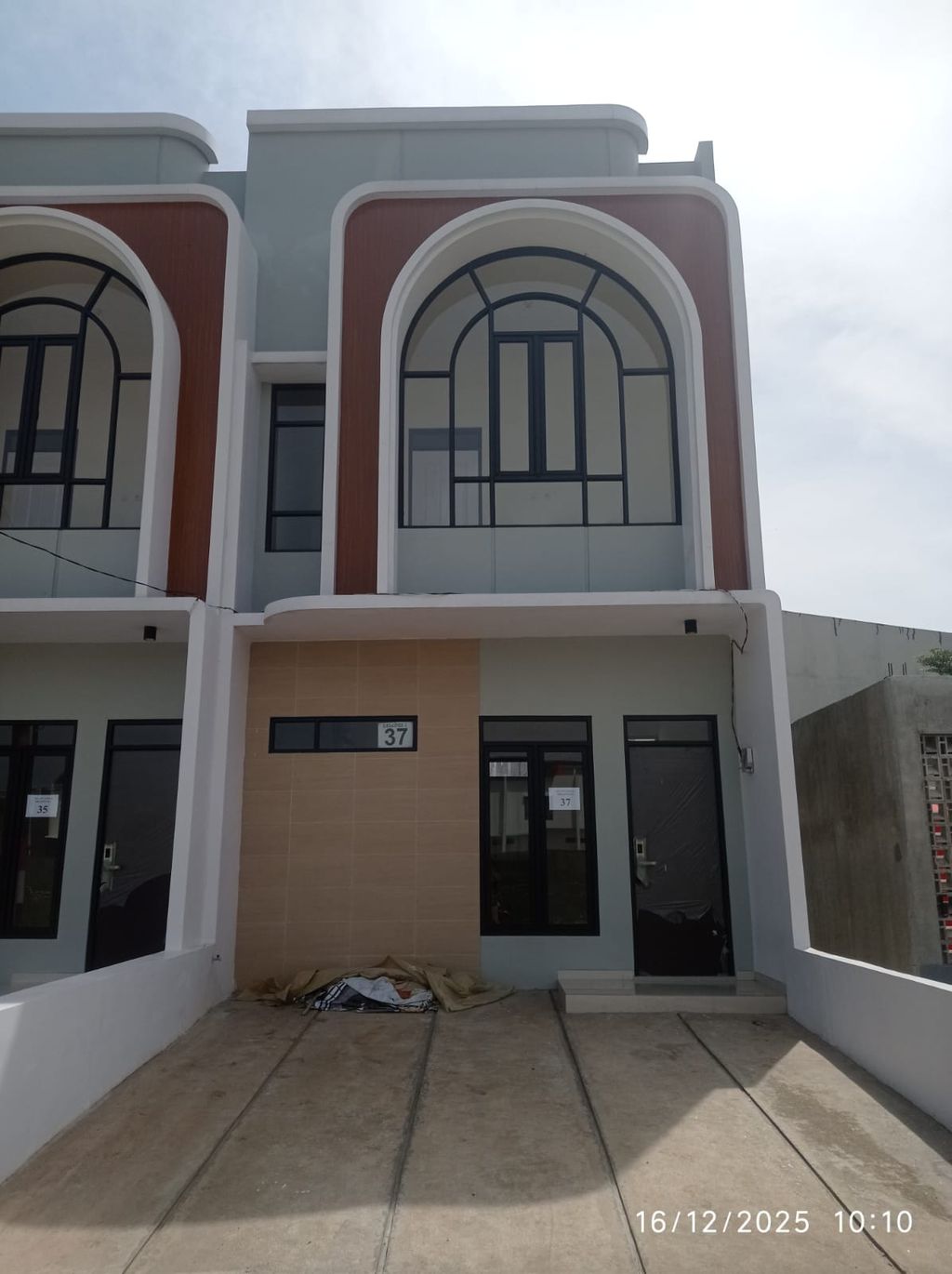 foto tampak rumah tipe 50 Compact 3 Kamar HC (550) perumahan G-Land Ciwastra Park 2