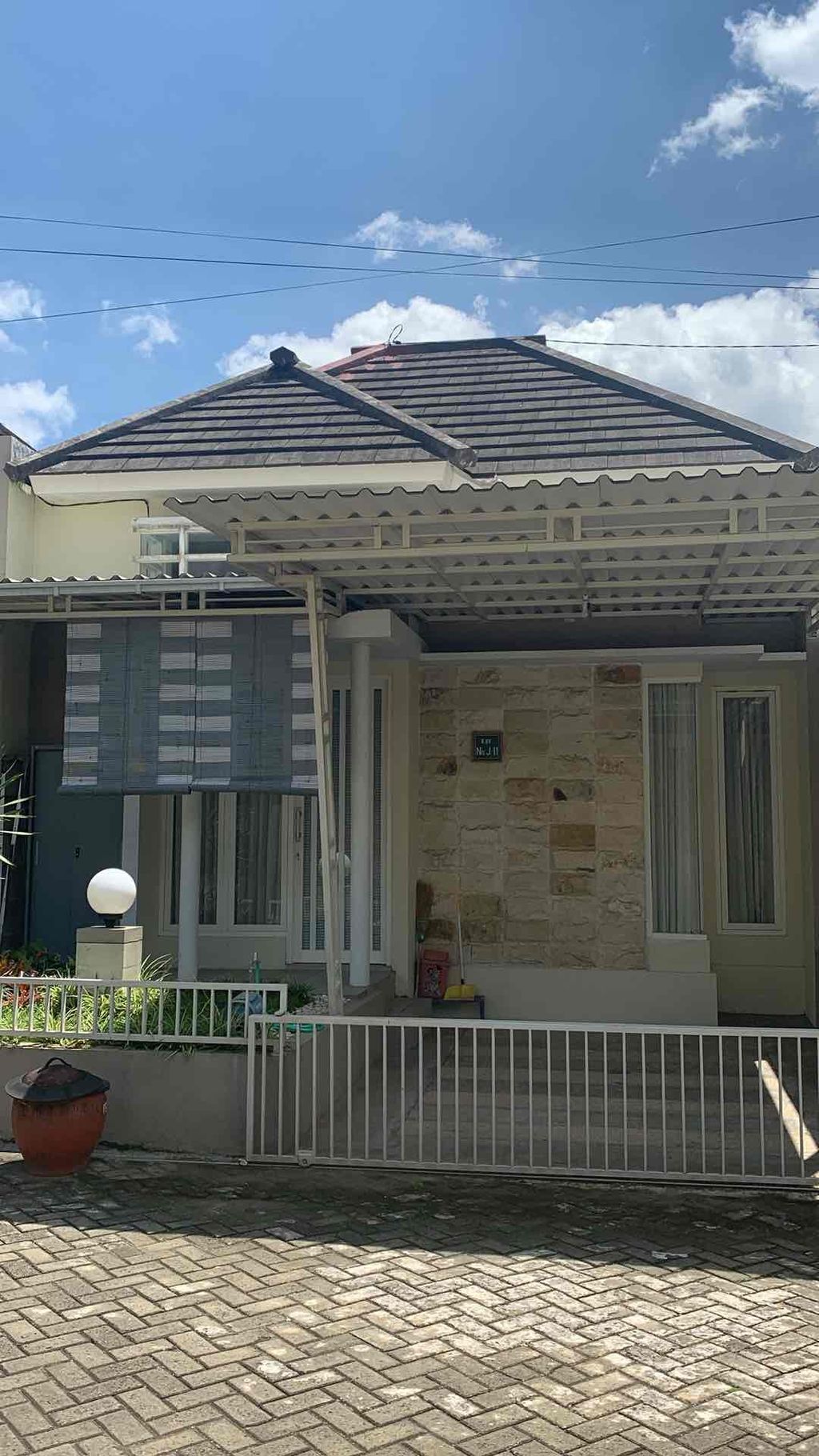 foto tampak rumah tipe J-11 PGR perumahan PERMATA REGENCY TAHAP 2