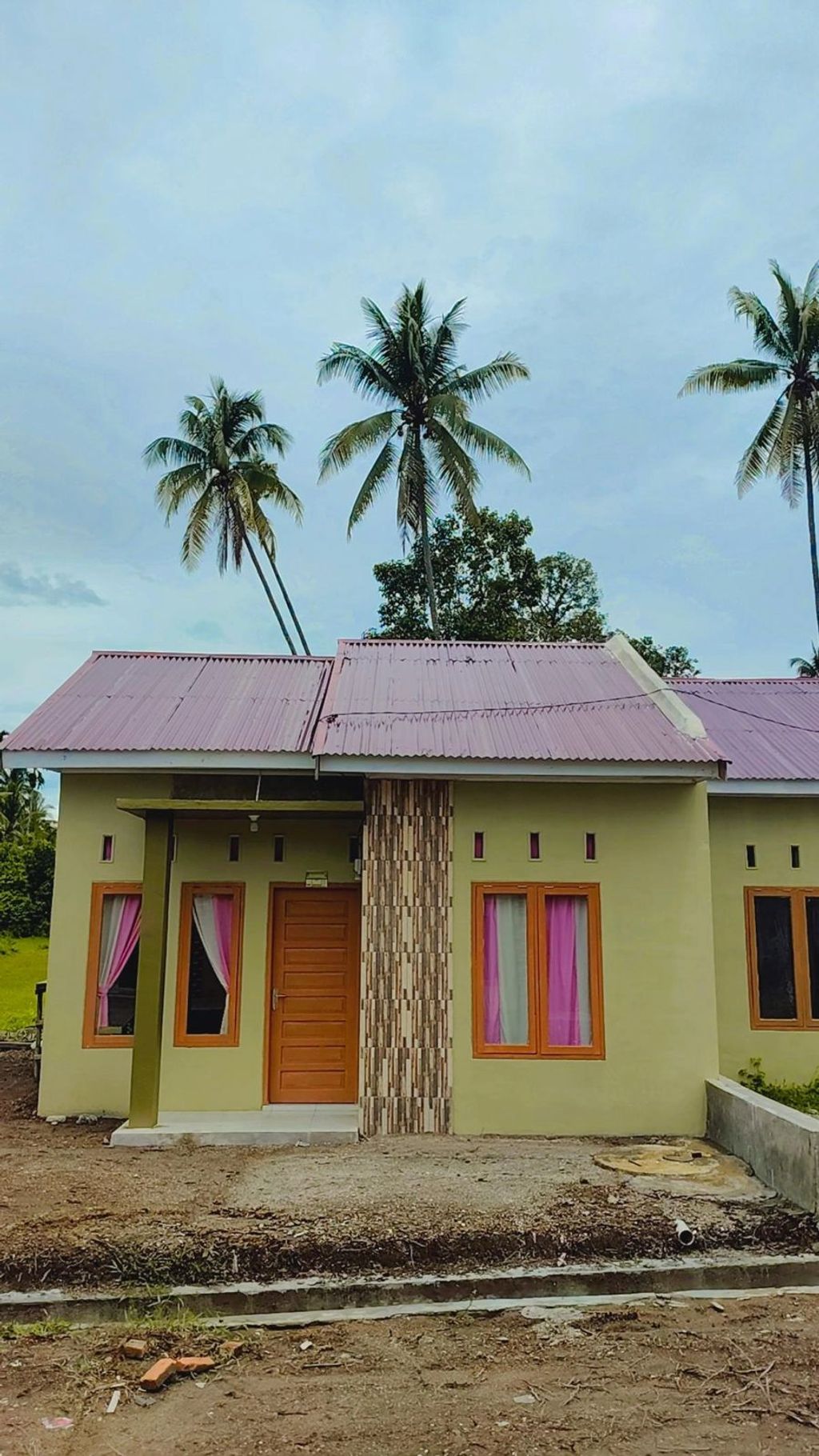 foto tampak rumah tipe 36 perumahan D'NAFA ROYAL GARDEN PAUH
