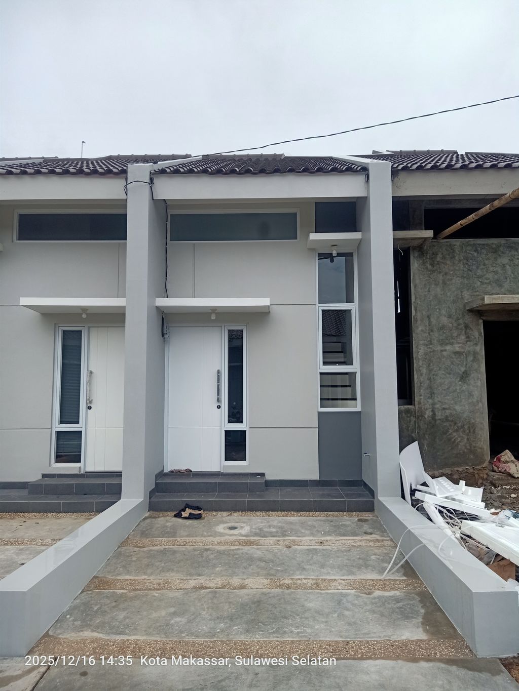 foto tampak rumah tipe Cluster Pinus 31 perumahan MEGAH NUSA MADANI