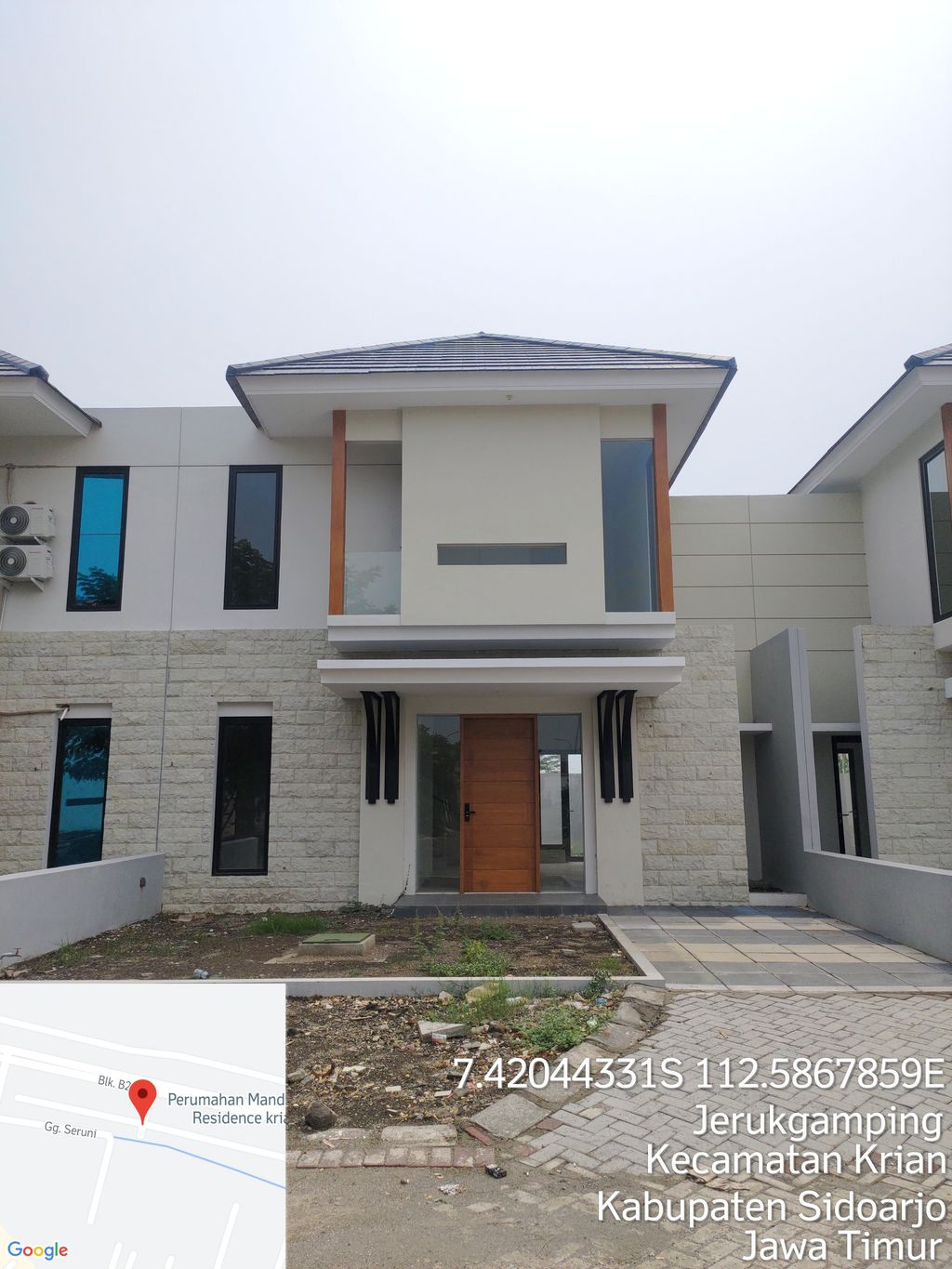 foto tampak rumah tipe DANDELIUM 233 perumahan Mandiri Residence