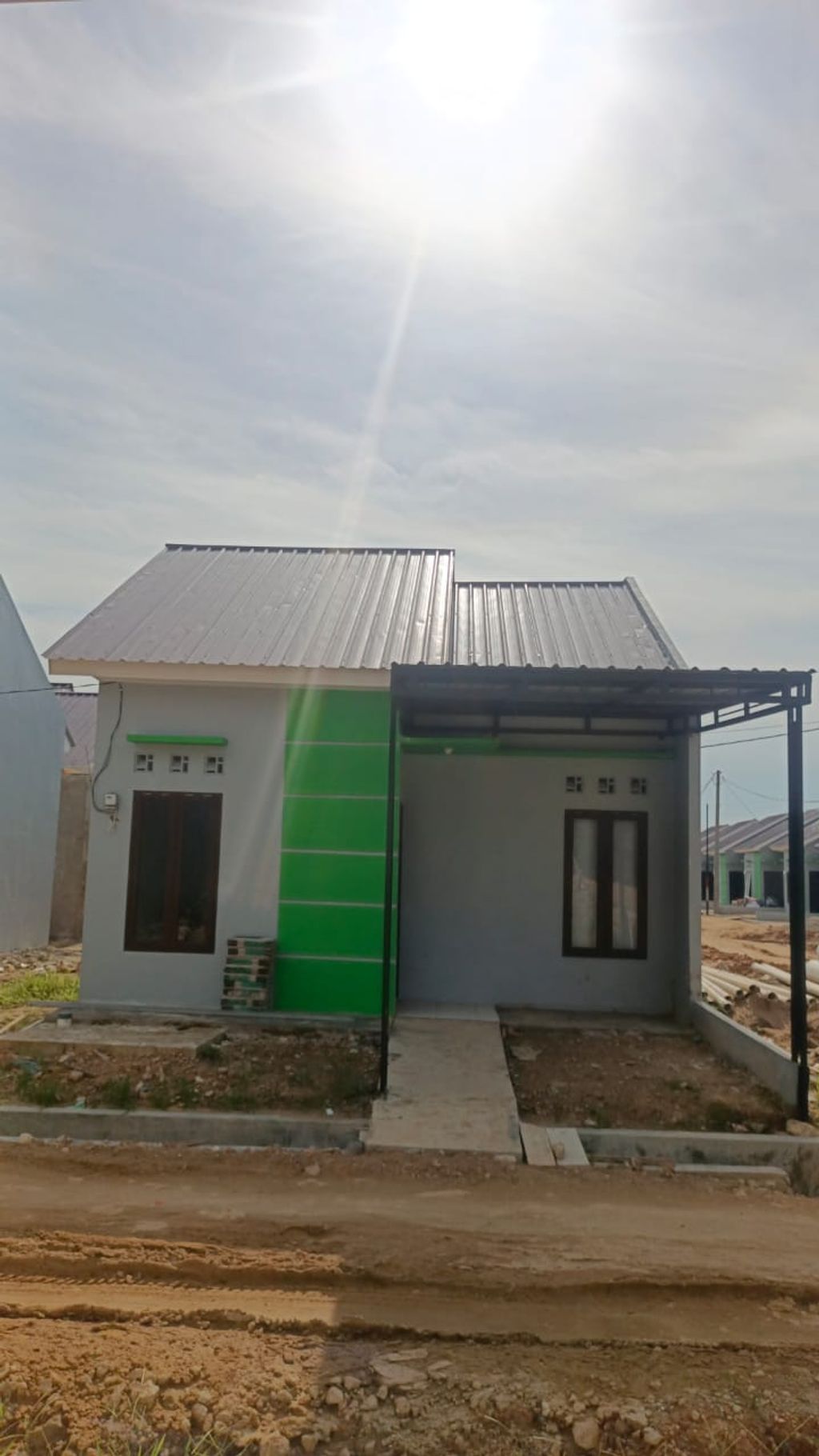 foto tampak rumah tipe 36/84 perumahan Grand Permata Hijau