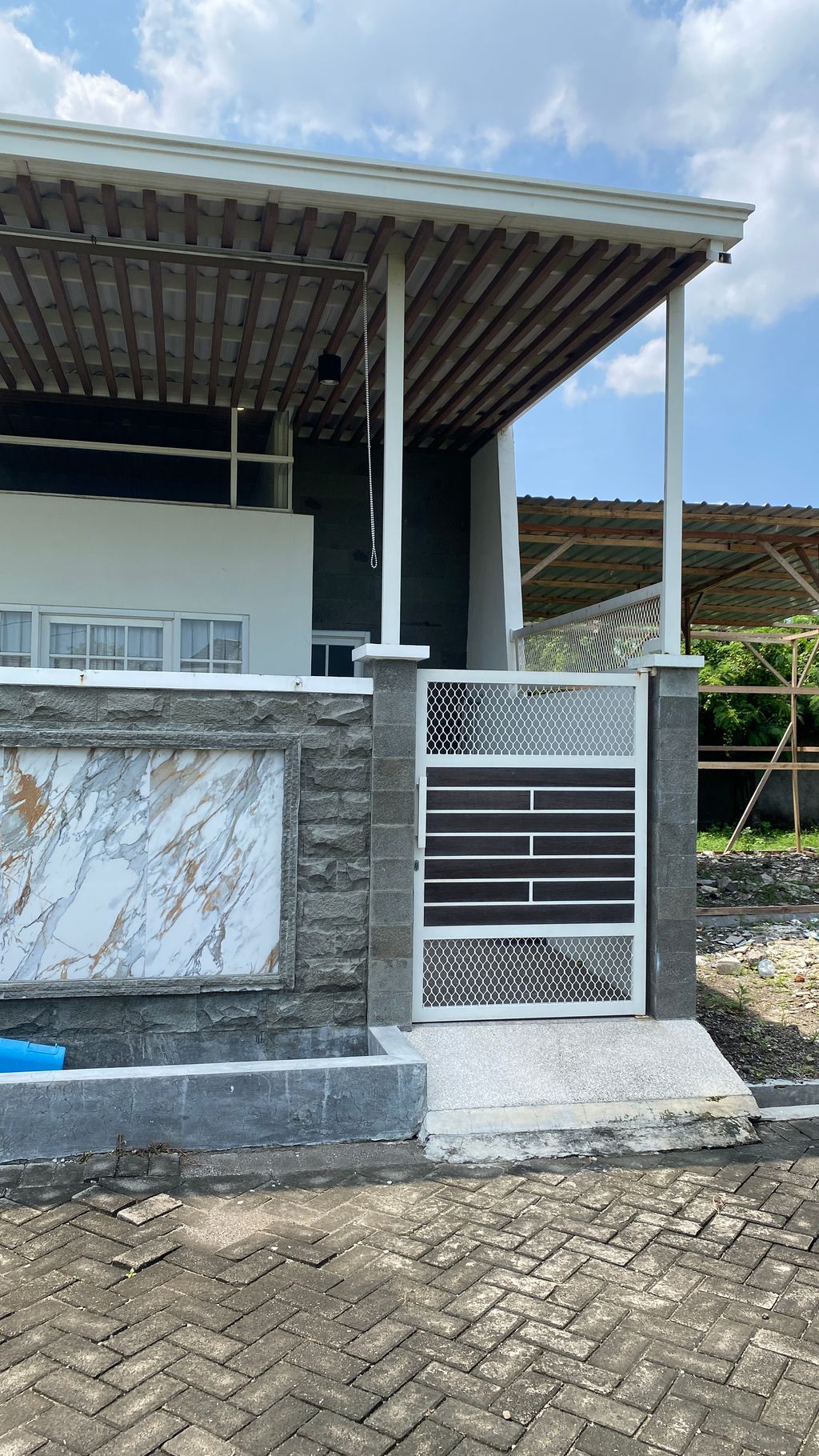 foto tampak rumah tipe Lavender perumahan Puri Asri Regency - Pengembangan