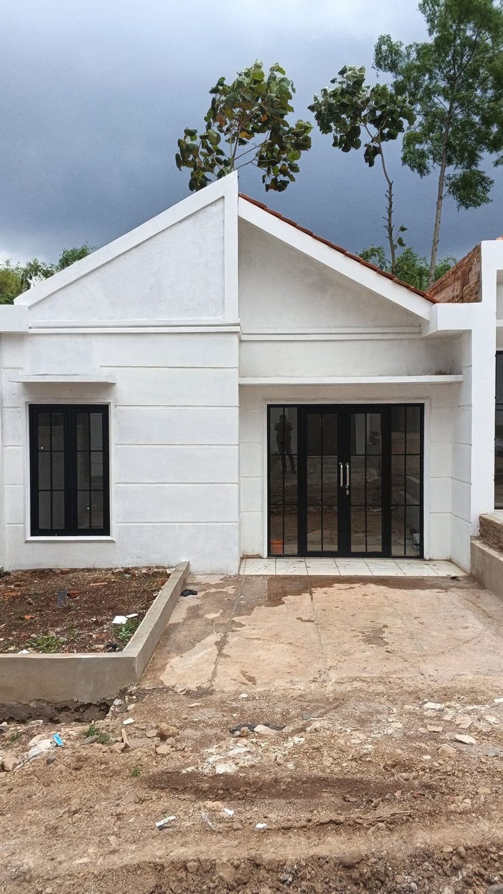 foto tampak rumah tipe American Classic perumahan Sky Garden Residence