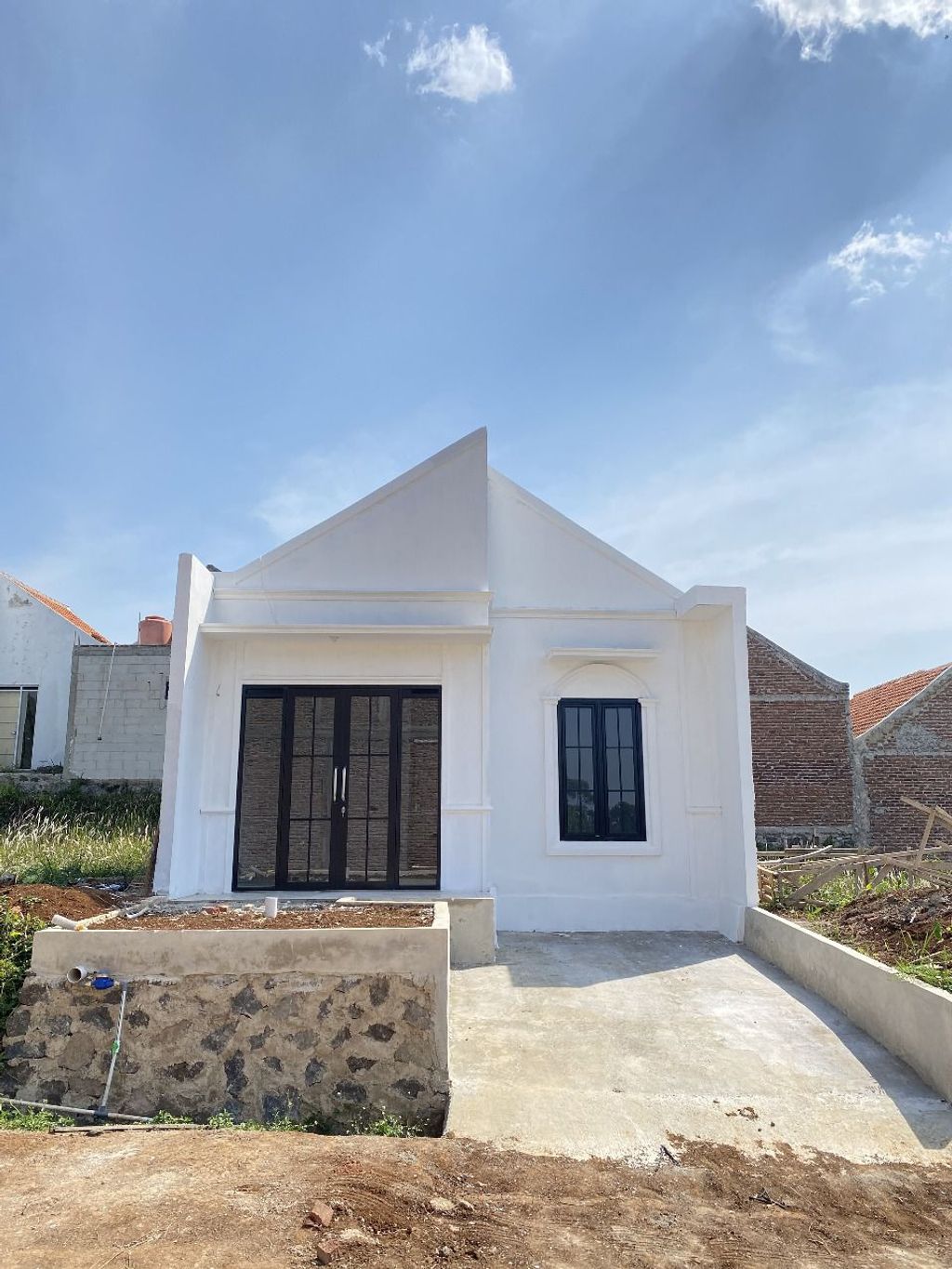 foto tampak rumah tipe Rumah Subsidi Eropa perumahan DE JAVA VALLEY RESIDENCE