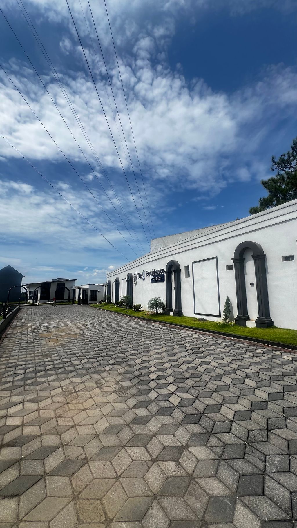 foto gerbang perumahan THE 9 PANGESTU