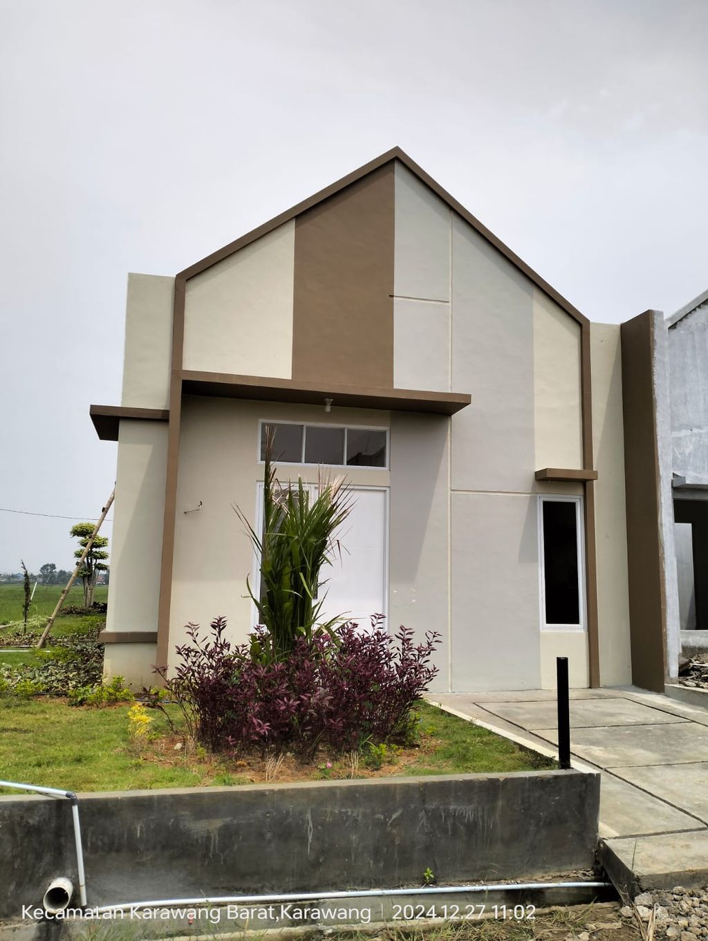 foto tampak rumah tipe AKASIA perumahan Mangkualam Karawang