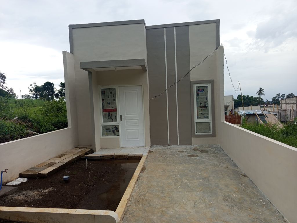 foto tampak rumah tipe BROMO perumahan PERUMAHAN PURI NIRWANA TUMPANG