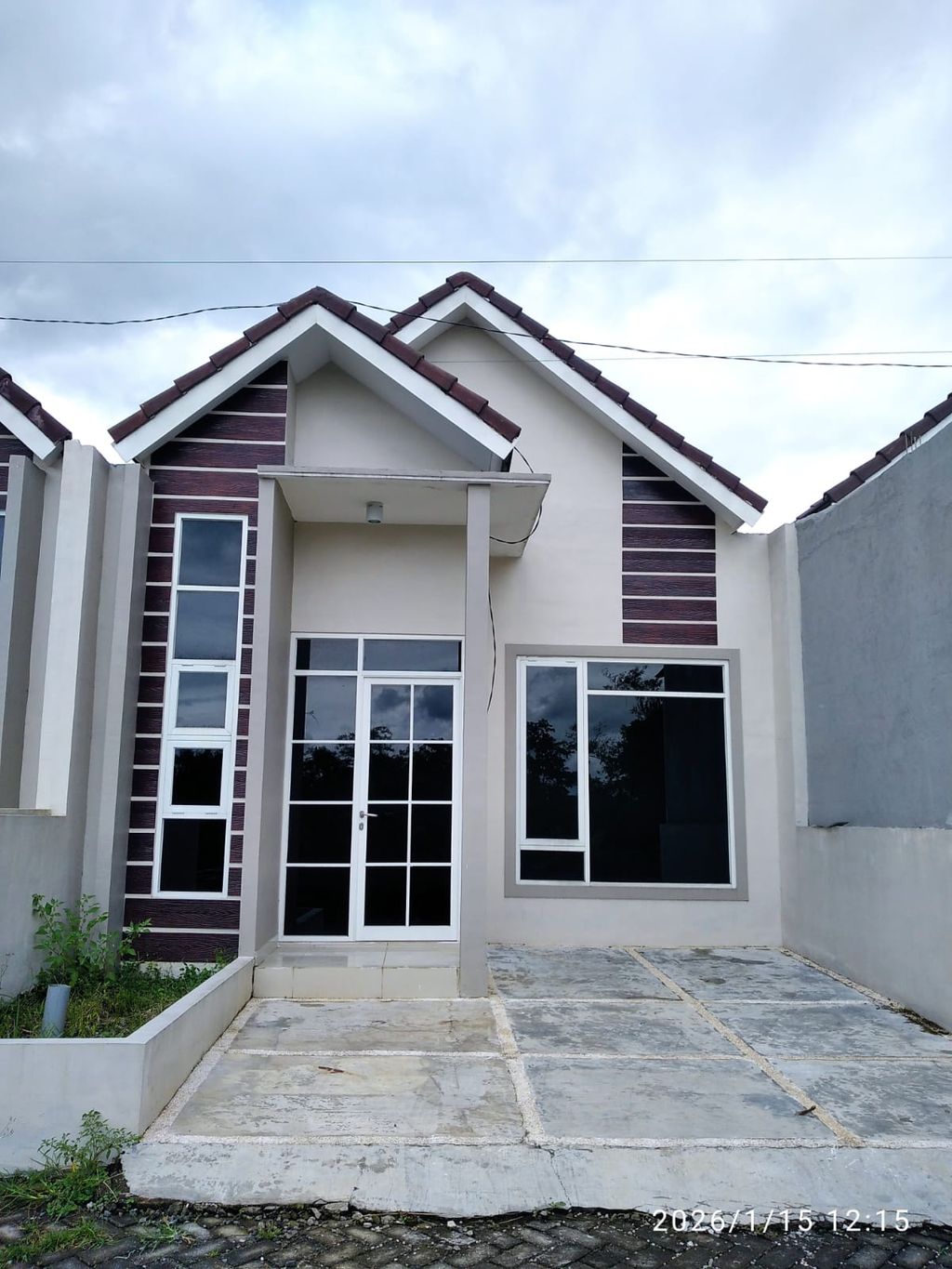foto tampak rumah tipe EDELWEISS 1 perumahan GRAND TANJUNG PRIUK 3