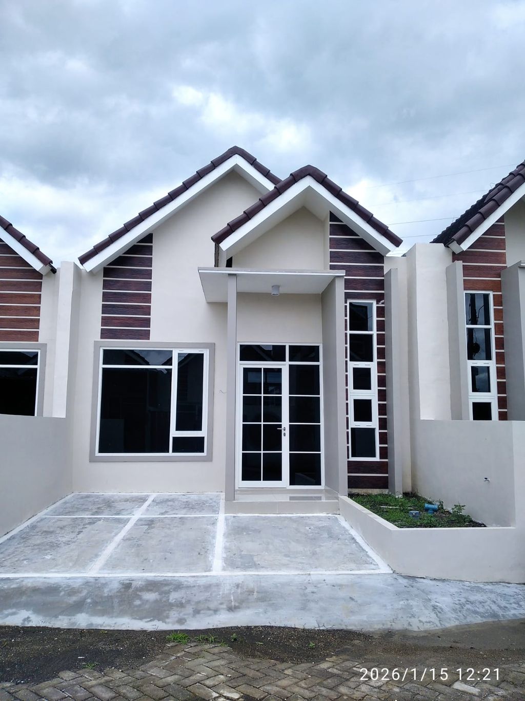 foto tampak rumah tipe EDELWEISS perumahan GRAND TANJUNG PRIUK 3