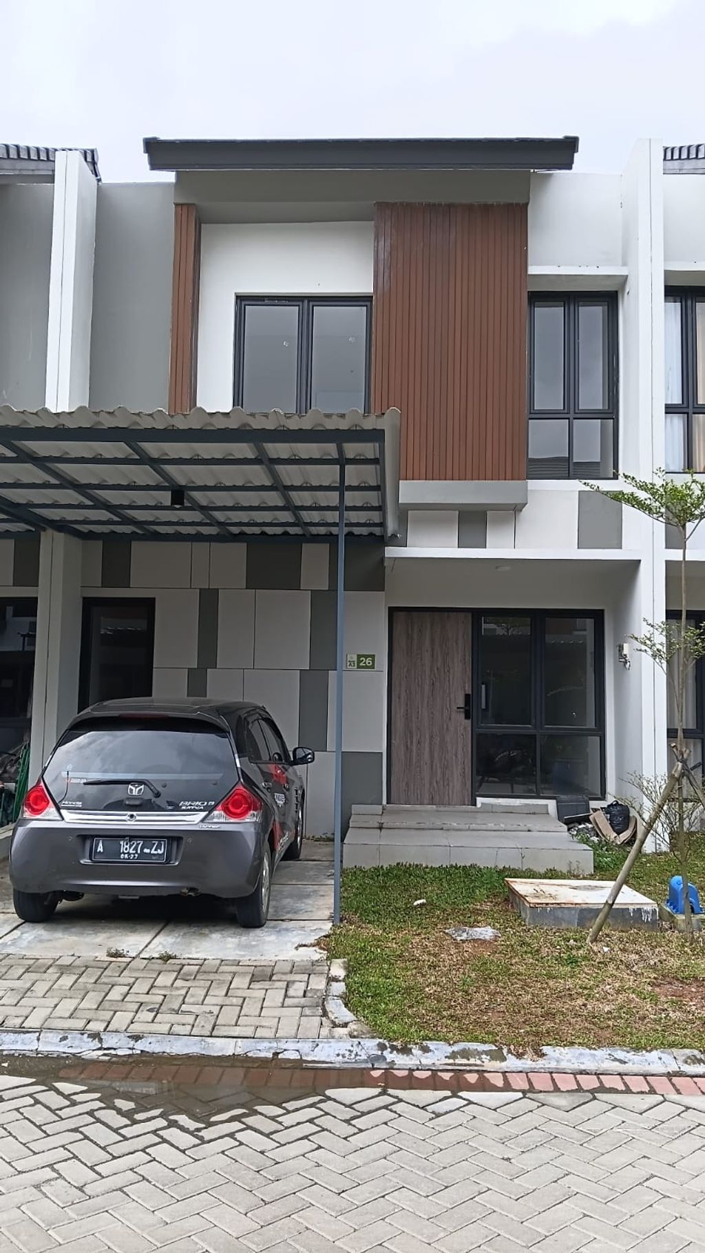 foto tampak rumah tipe SAPPHIRE perumahan GRAND ALMAS RESIDENCE