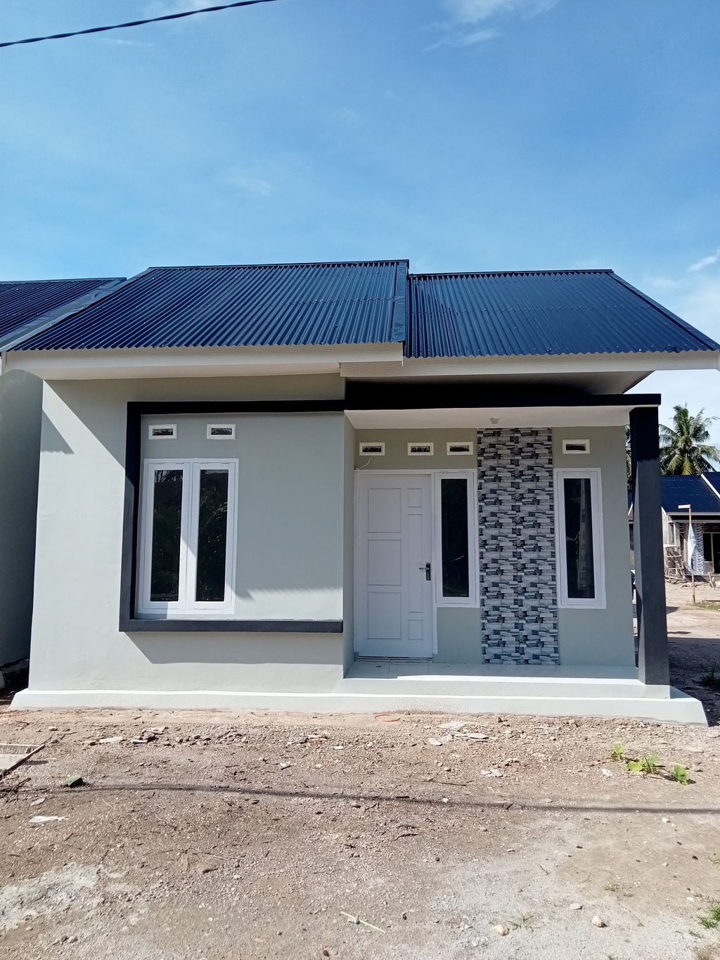 foto tampak rumah tipe 36 perumahan WANEKA GREEN LAND 4