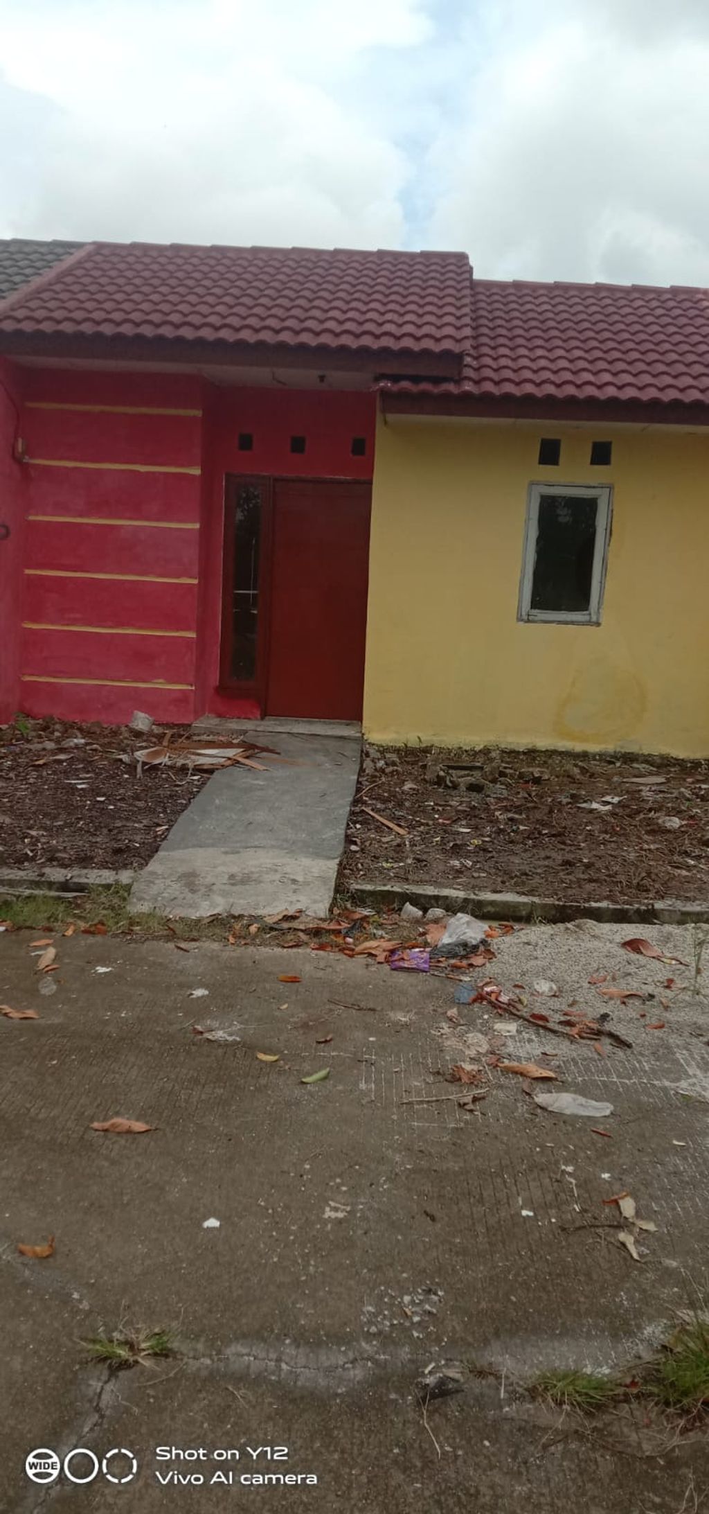 foto tampak rumah tipe 30 x 110 perumahan GRIYA JUNTI ASRI