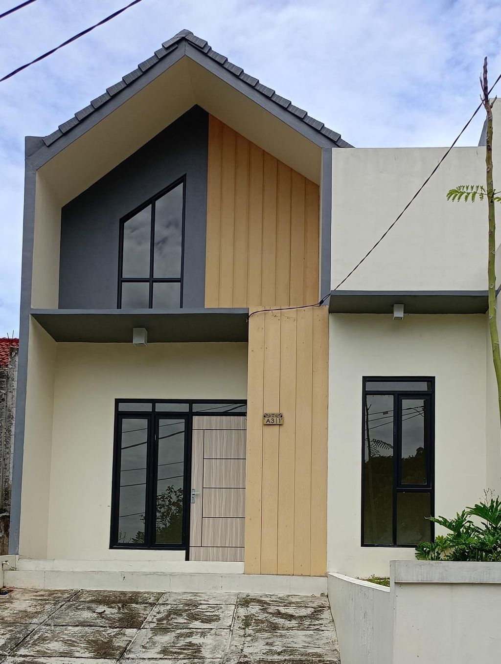 foto tampak rumah tipe Andaru 36/72 perumahan Pesona Alam Jatinangor 