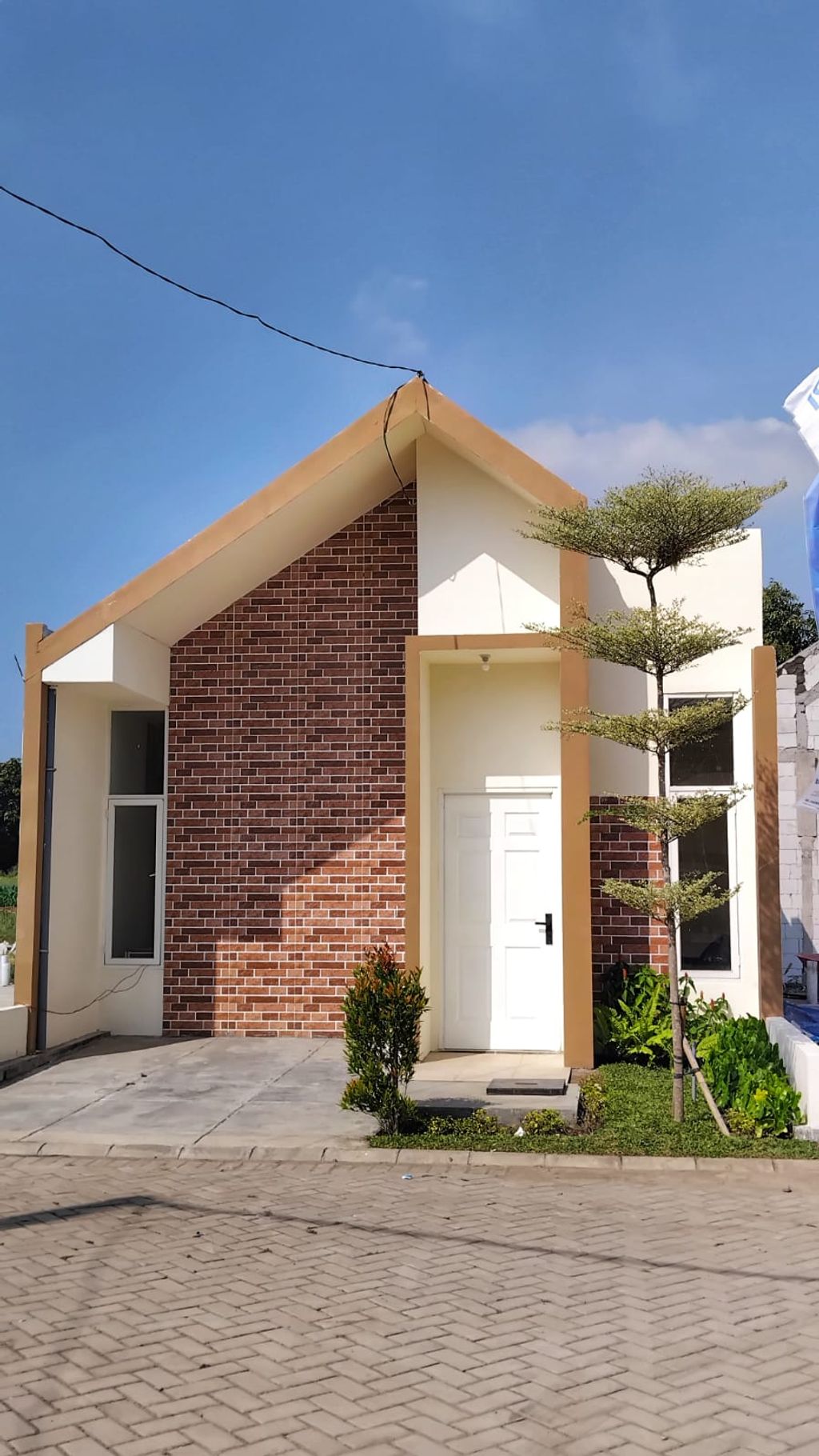 foto tampak rumah tipe Borobudur B perumahan AMERTA RESIDENCE