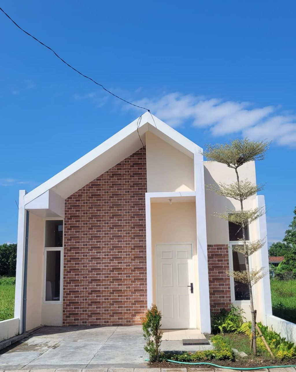 foto tampak rumah tipe Windmolen perumahan AMERTA RESIDENCE