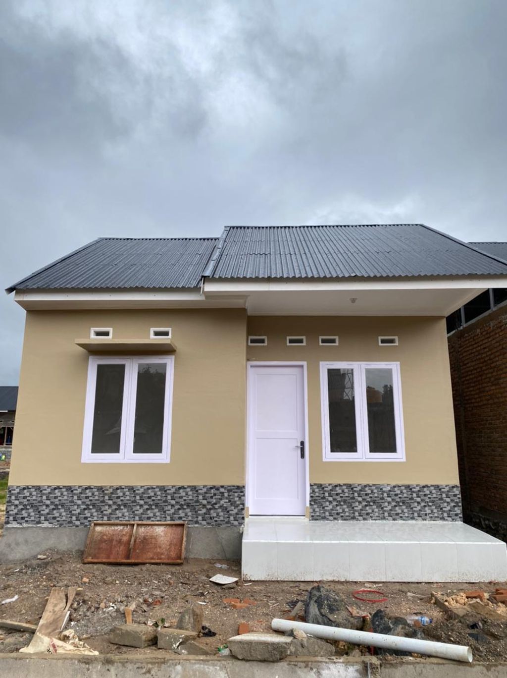 foto tampak rumah tipe 36 perumahan TAMAN ASRI 10