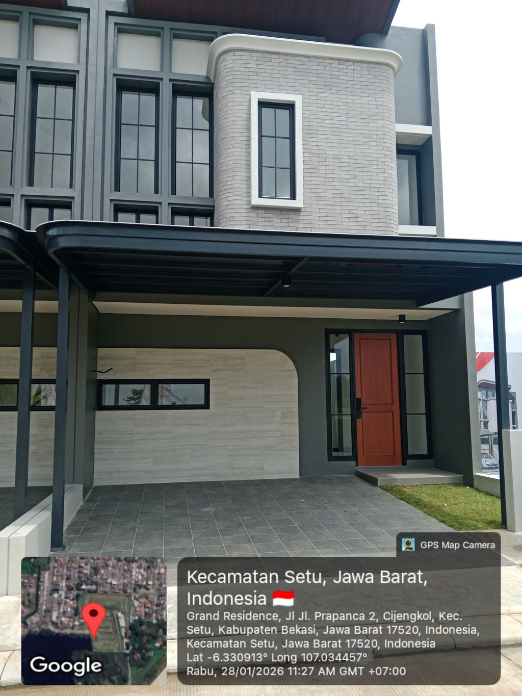 foto tampak rumah tipe Araya perumahan GRAND RESIDENCE CITY.