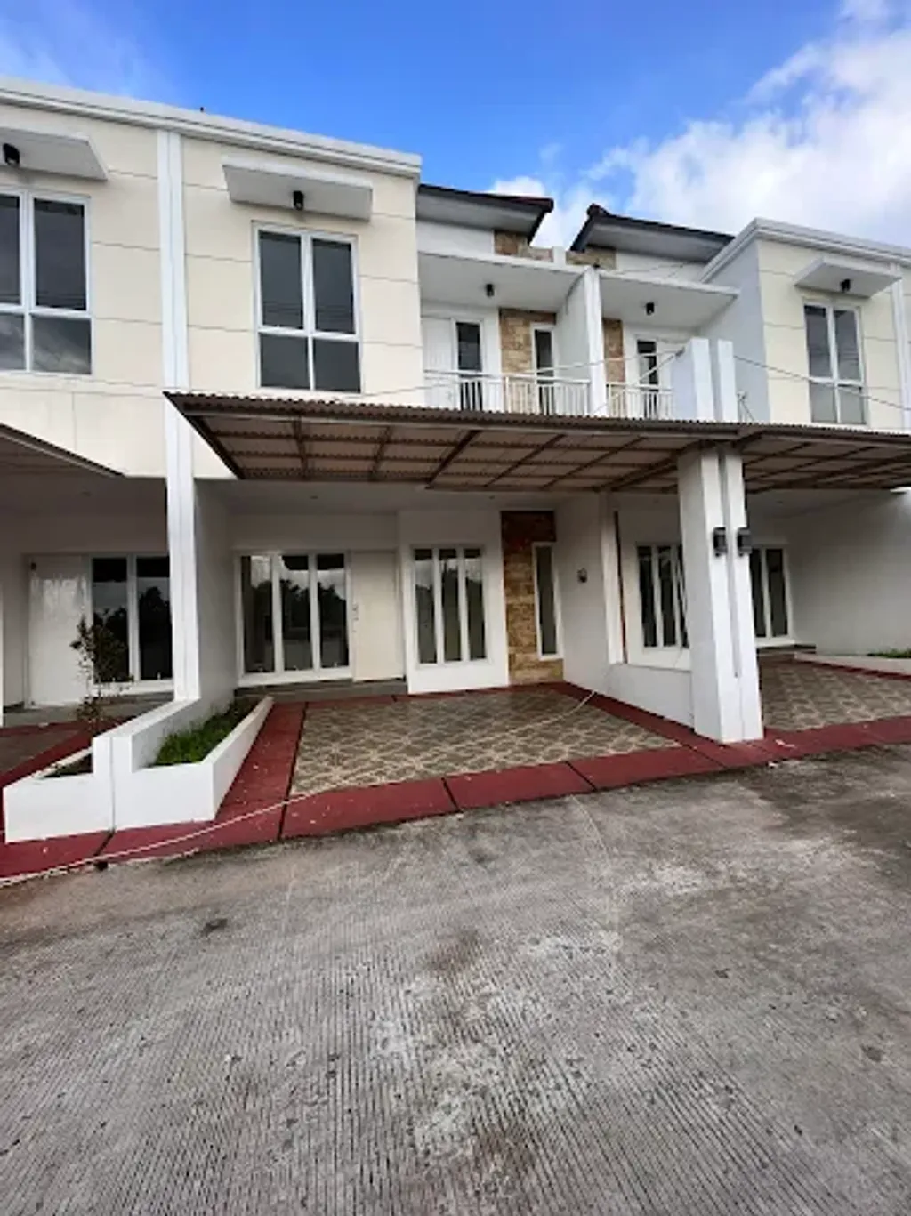 foto tampak rumah tipe 70 perumahan TRIA ADARA RESIDENCE 9 CIPUTAT