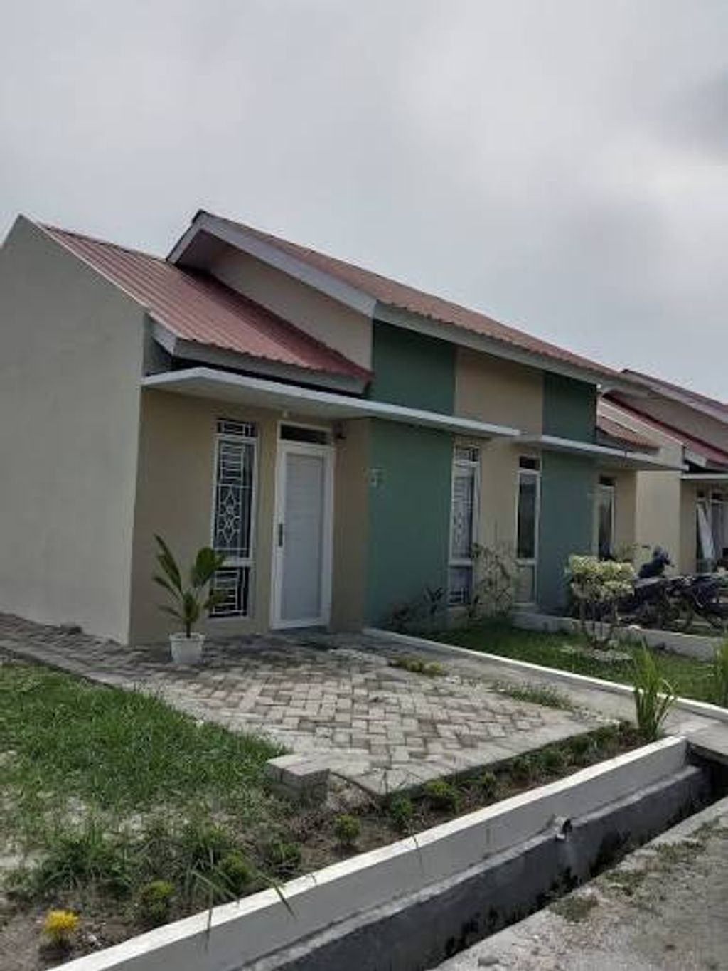 foto contoh rumah perumahan GRIYA MARTUBUNG 3 DOLONIX MAGNOLIA RAFLESIA
