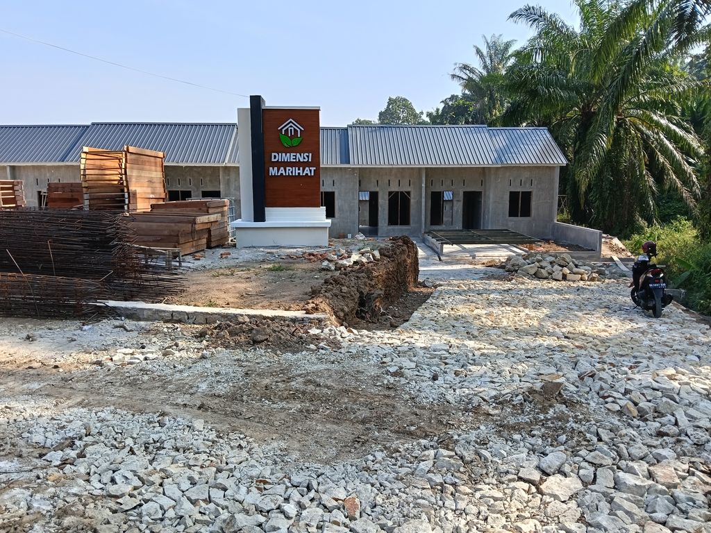 foto gerbang perumahan Dimensi Marihat