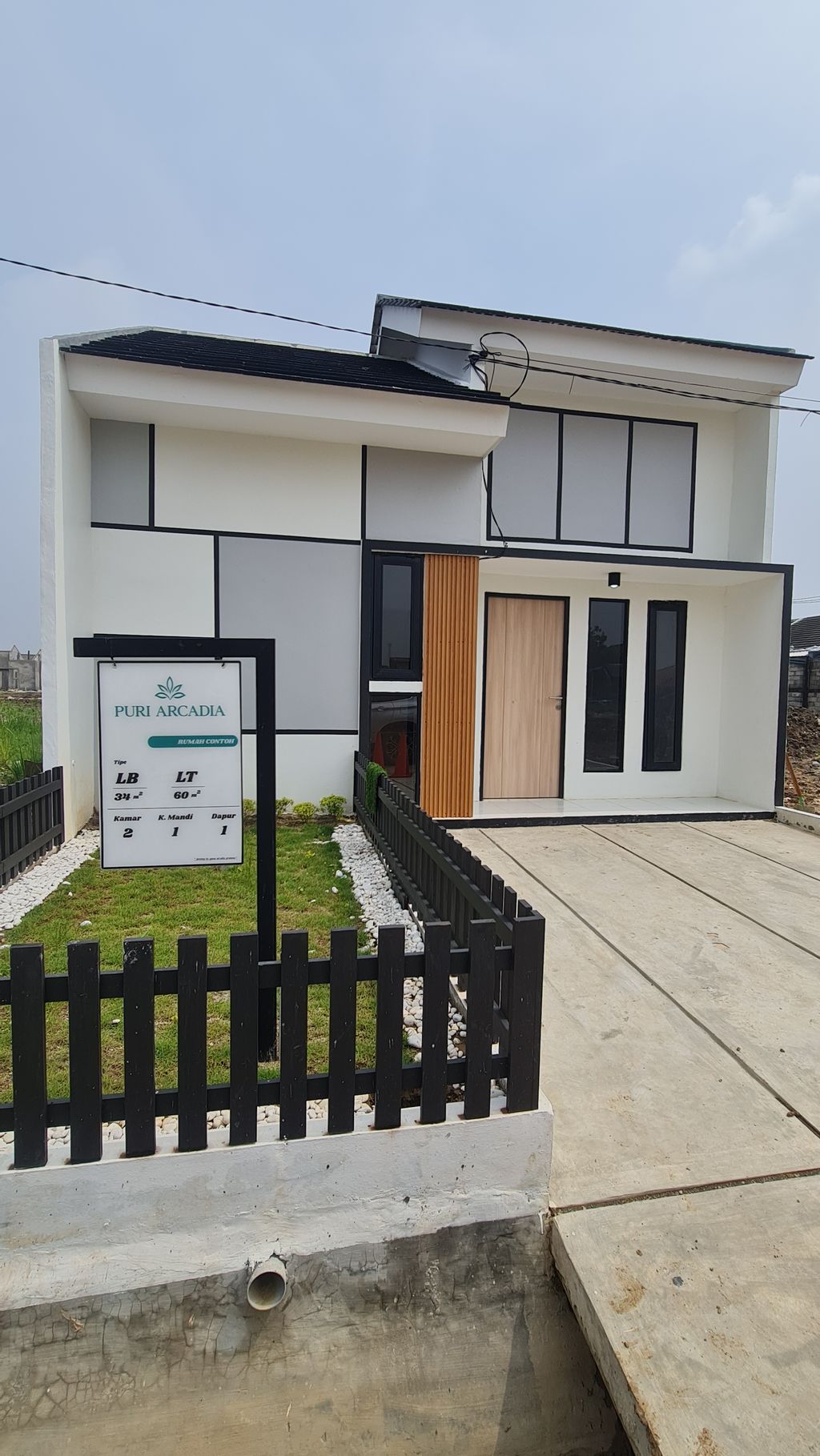 foto contoh rumah perumahan Puri Arcadia Sukarukun I