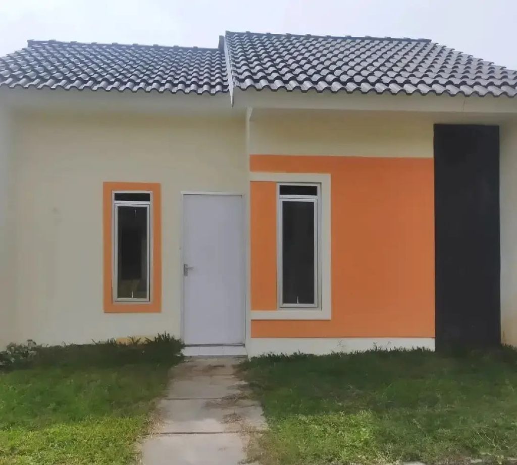 foto tampak rumah tipe ZAMRUD perumahan PANORAMA KEMANG