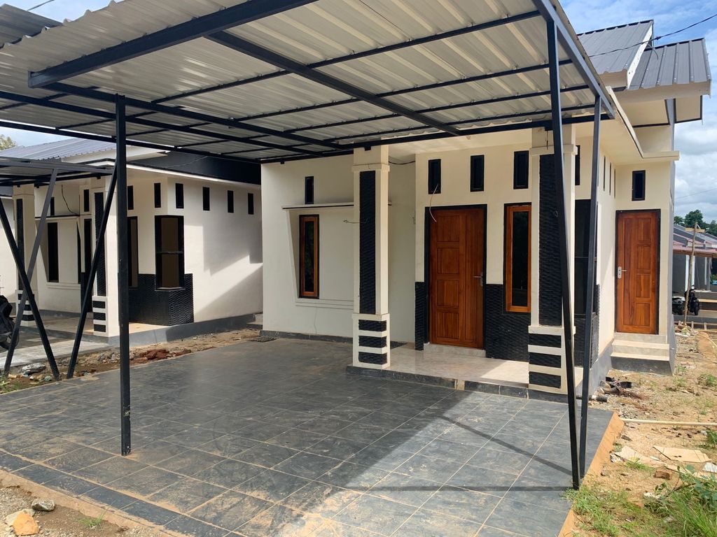 foto tampak rumah tipe 45 perumahan PURI KHANISSA RESIDENCE V
