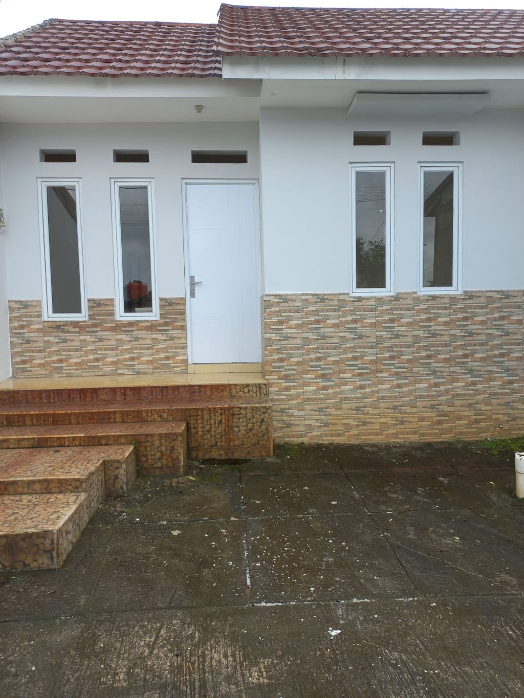 foto tampak rumah tipe Jalal perumahan Kamilan Ciracas Permai
