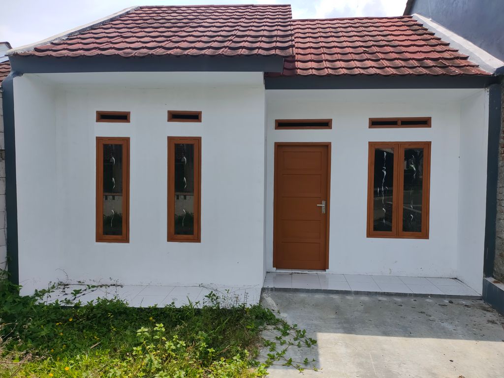 foto tampak rumah tipe 36 perumahan Duta Karang Residence