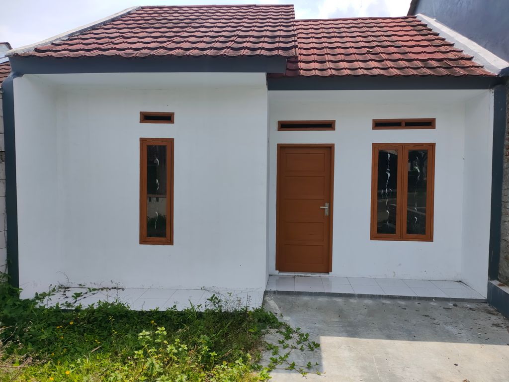 foto tampak rumah tipe 36 perumahan Duta Karang Residence