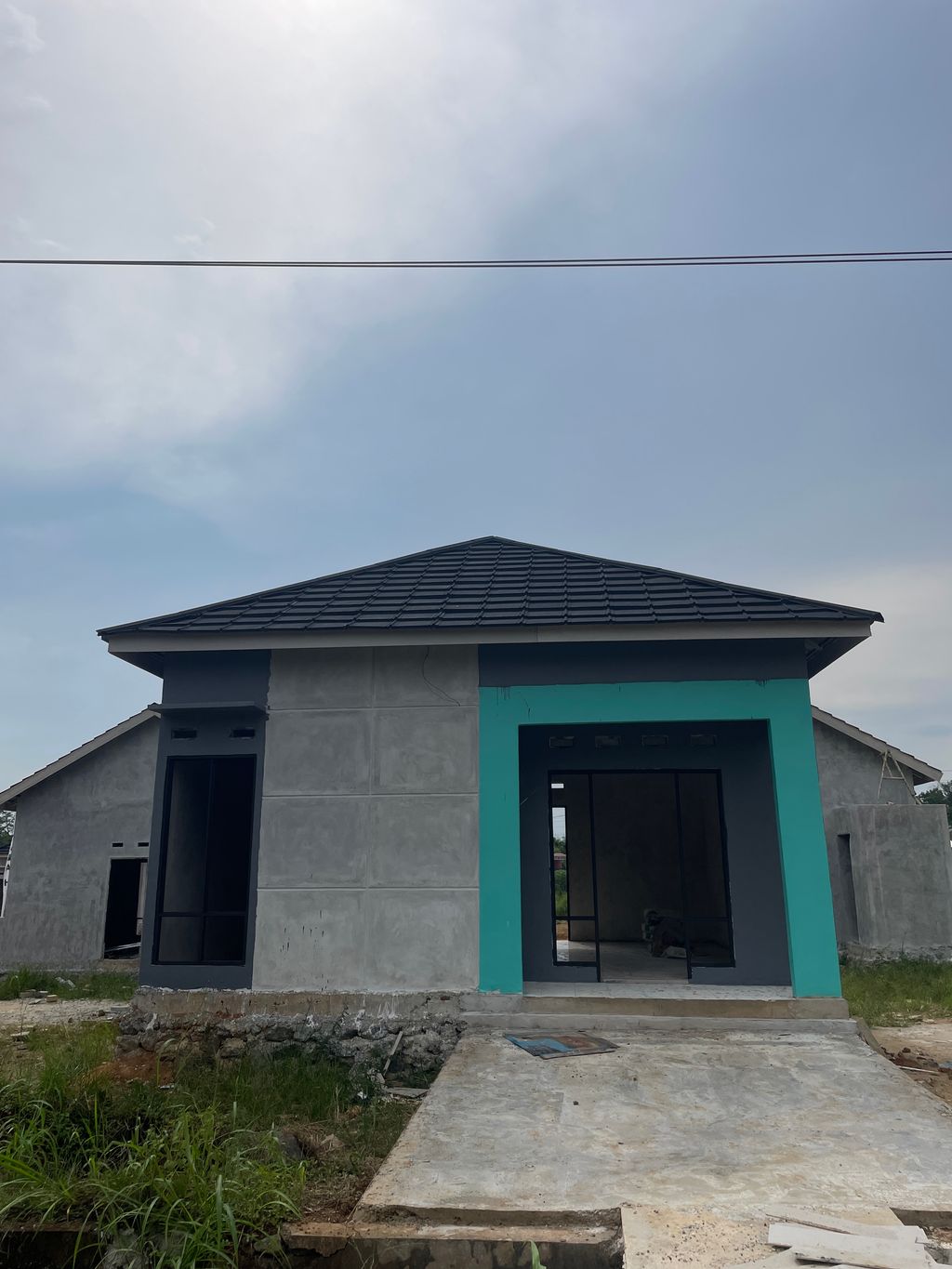 foto contoh rumah perumahan CORUNA HILLS