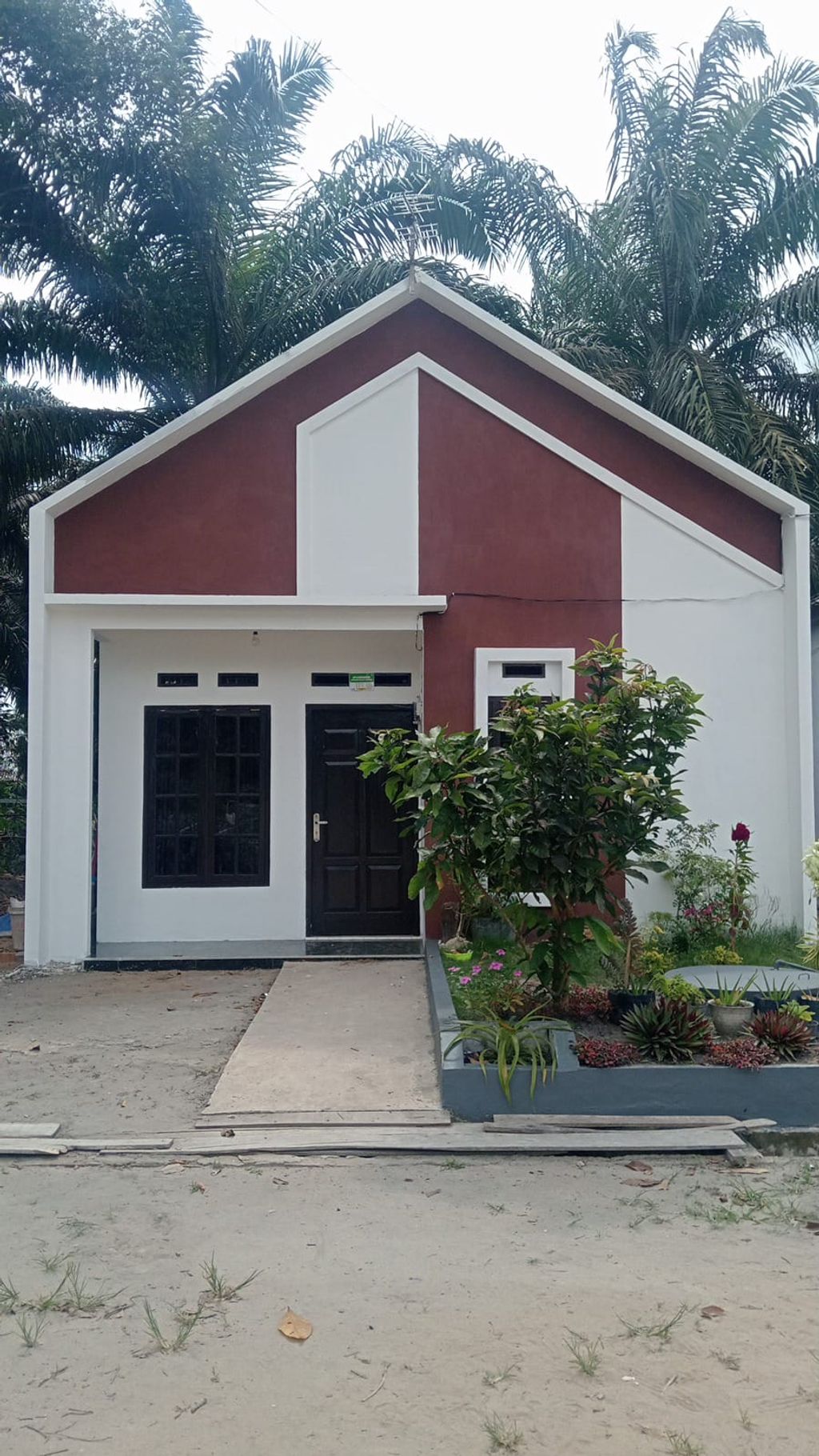 foto tampak rumah tipe RSH perumahan GRAND IKHTIAR 1