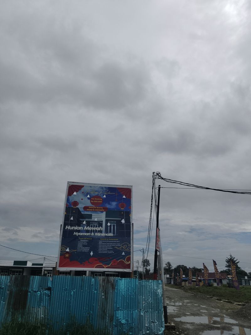 foto gerbang perumahan RAFFLESS RESIDENCE 3