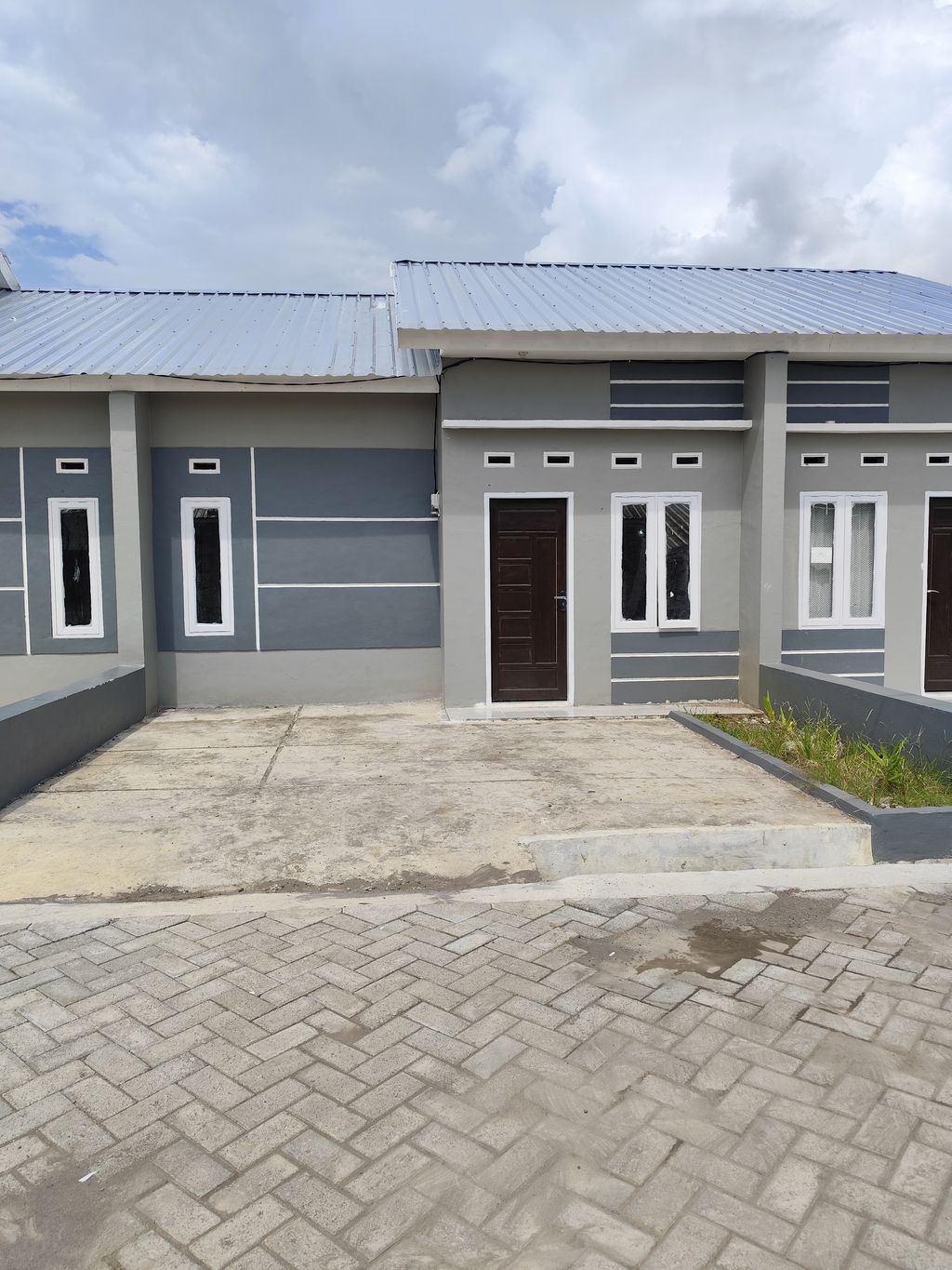 foto tampak rumah tipe 36/72 perumahan Padaelo Regency