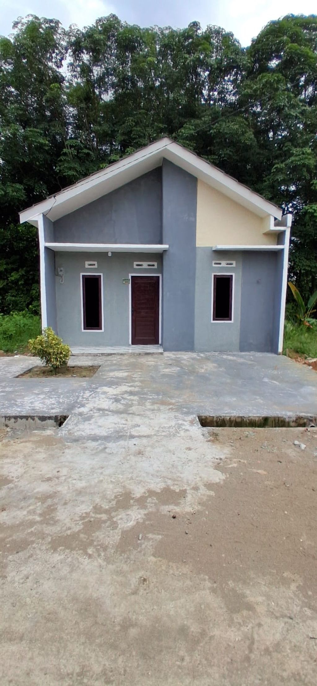 foto tampak rumah tipe 36/90 perumahan PESONA SUKAJADI