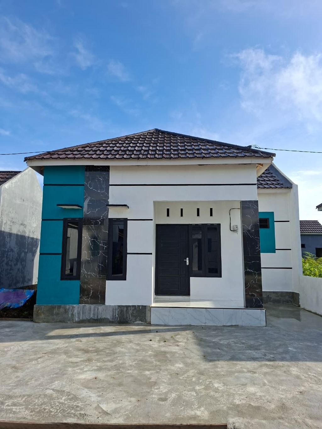 foto tampak rumah tipe 36 WMP9 perumahan WENGGA METROPOLITAN