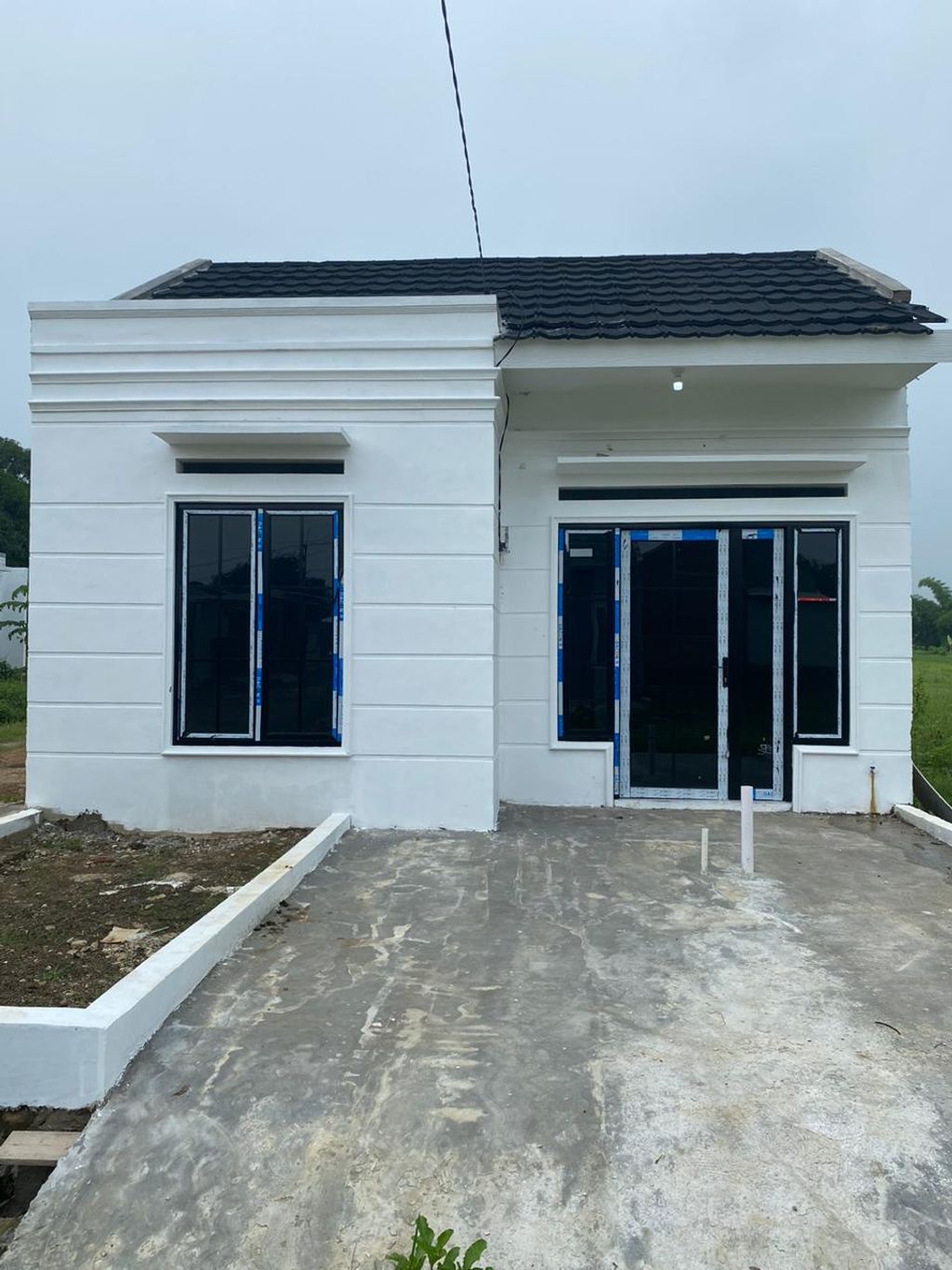 foto tampak rumah tipe American Minimalis perumahan EL HAGO RESIDENCE TAHAP II