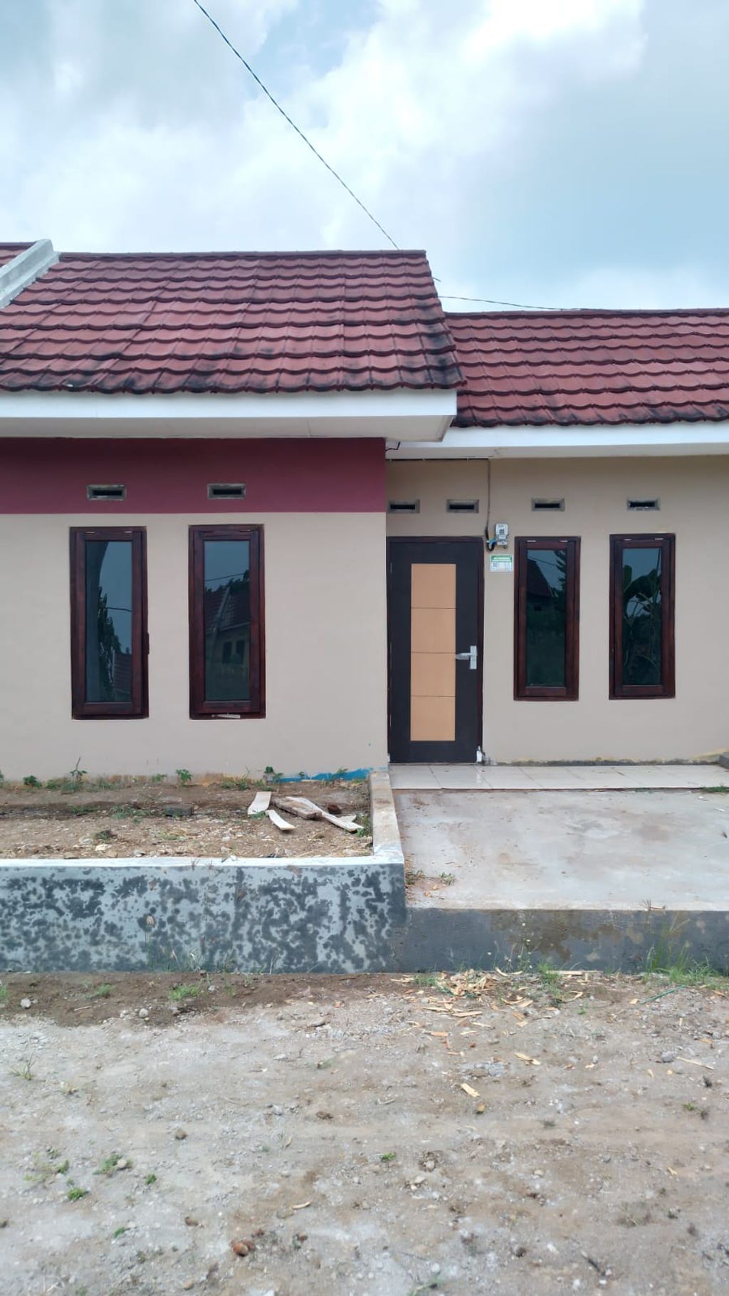 foto tampak rumah tipe 34 perumahan OEMAH TANJUNG ASRI
