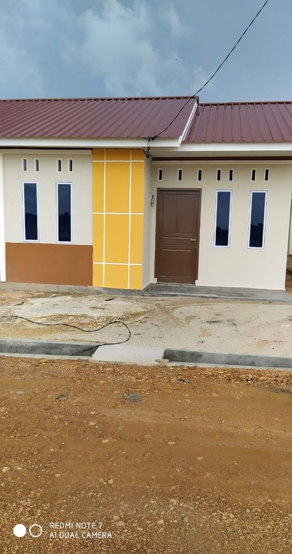 foto tampak rumah tipe 36/105 perumahan GRAND PERMAI RESIDENCE