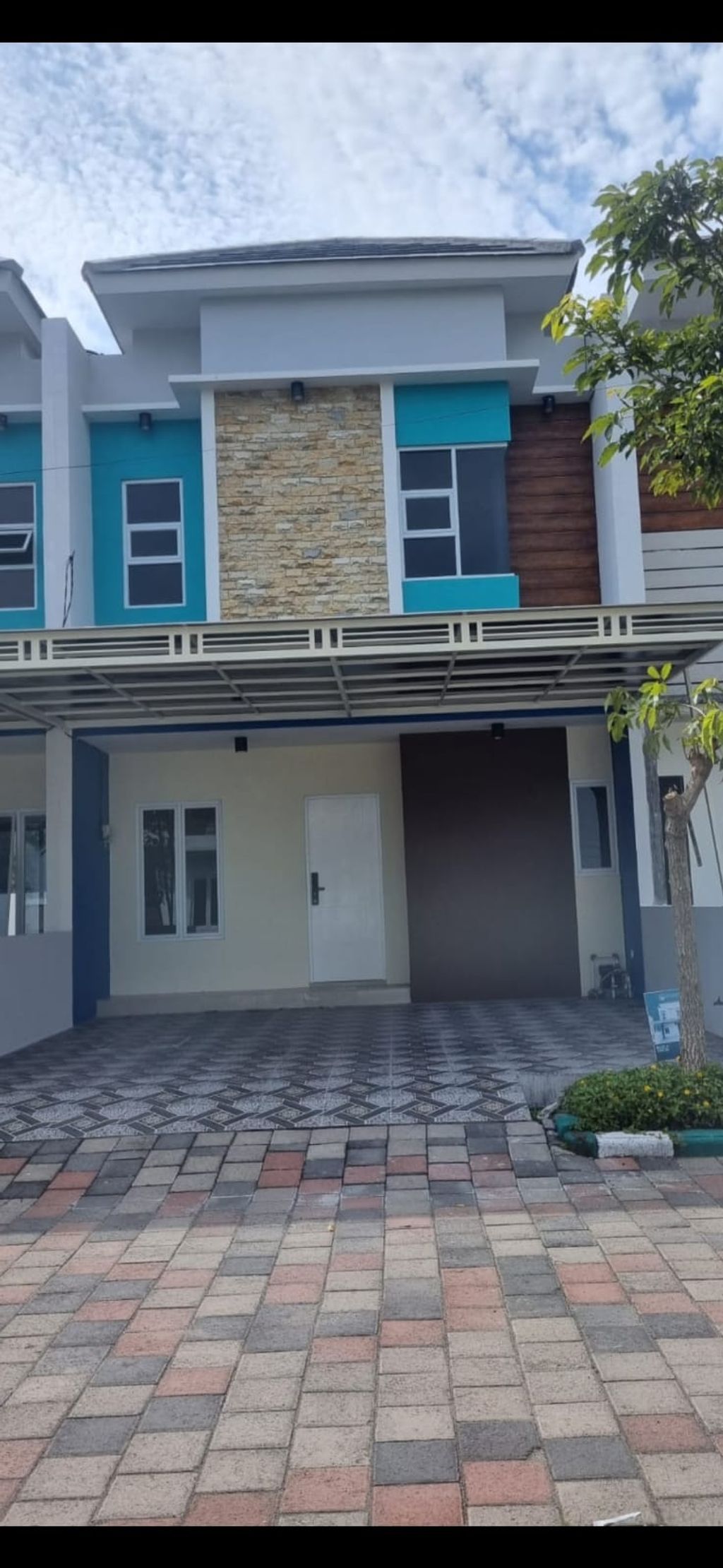 foto tampak rumah tipe T-50 A-08 perumahan GRAHA AMERTA BOULEVARD