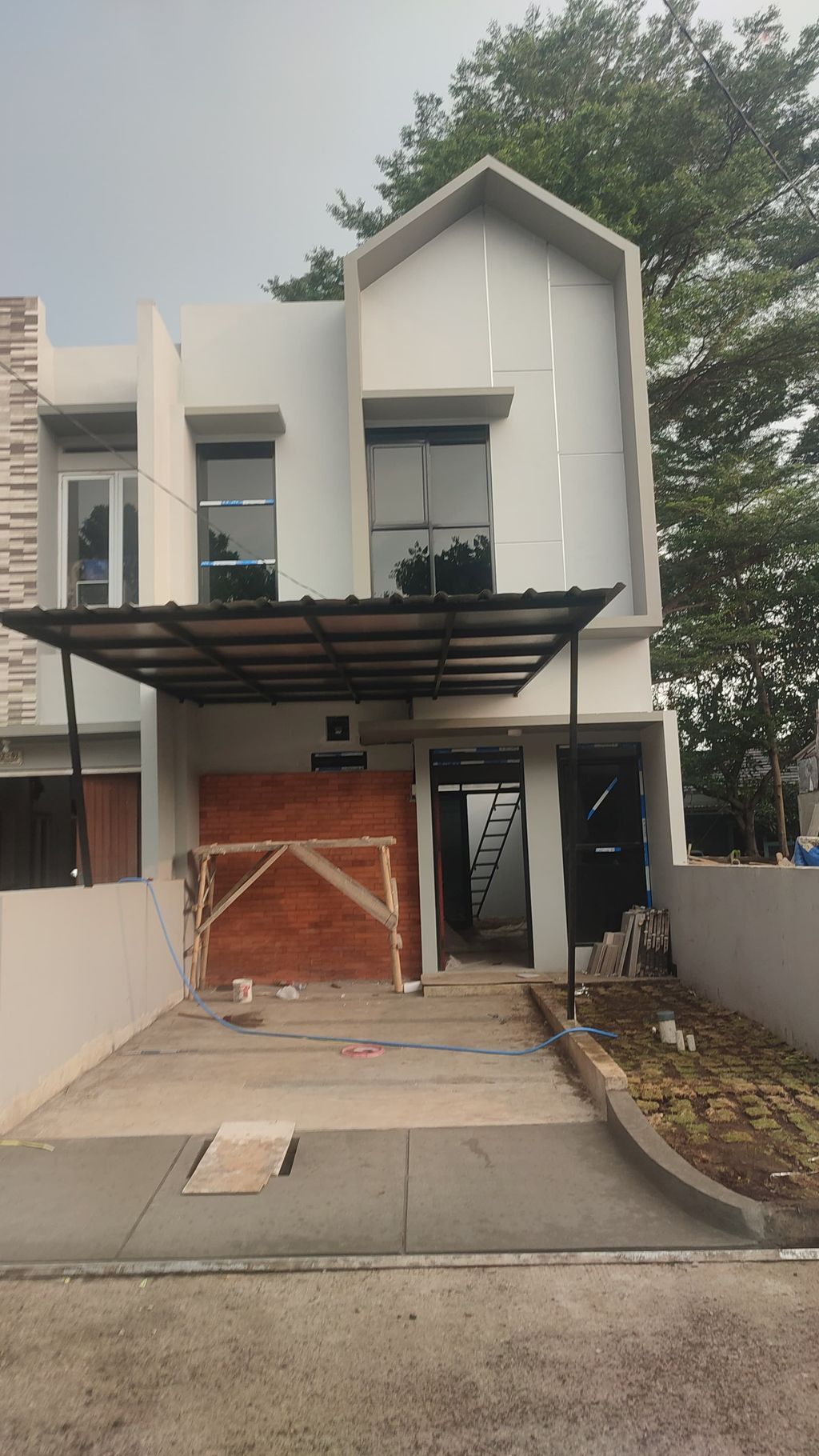 foto tampak rumah tipe 57 perumahan Padasuka Park