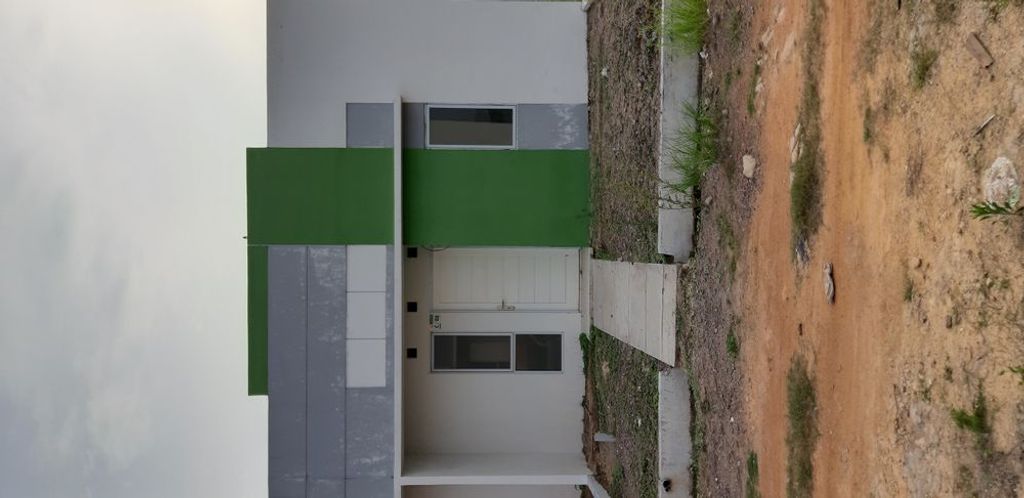 foto tampak rumah tipe 28/72 perumahan PUTRA JAYA RESIDENCE CLUSTER G