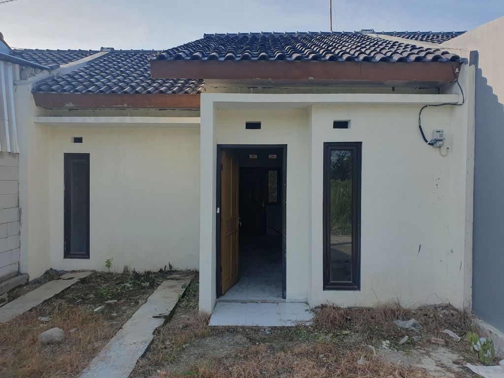foto tampak rumah tipe 36 /84 perumahan TAMAN PURI PERMATA 1