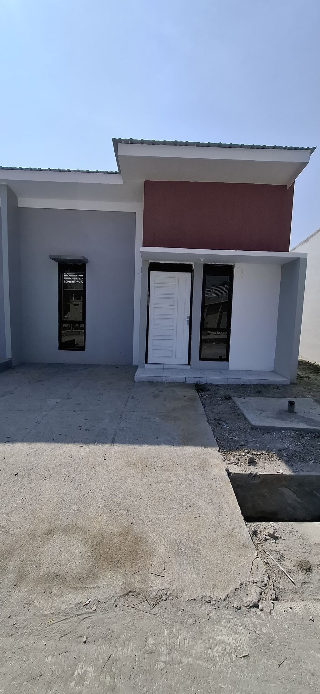 foto contoh rumah perumahan DELONIX GRIYA MARTUBUNG 3