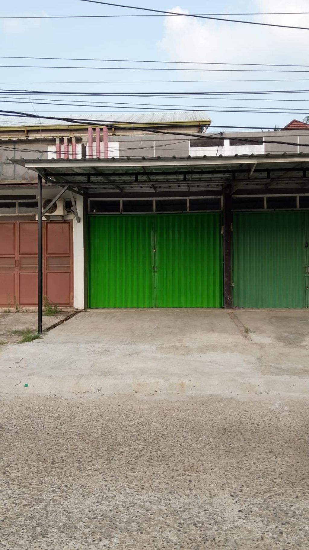 foto tampak rumah tipe Kios 40 perumahan Grand Melia Residence