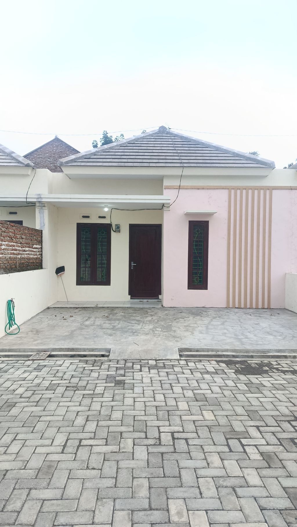 foto tampak rumah tipe 36/66 perumahan PALM GREEN RESIDENCE 2