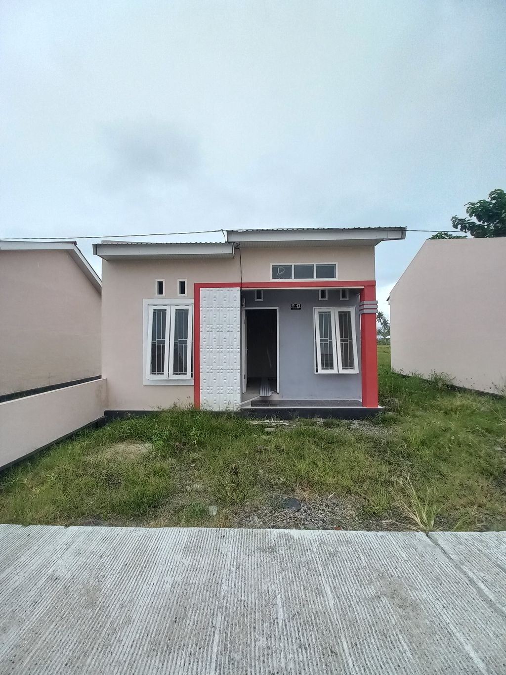 foto tampak rumah tipe 36 DG perumahan KELAPA GADING TAHAP IV
